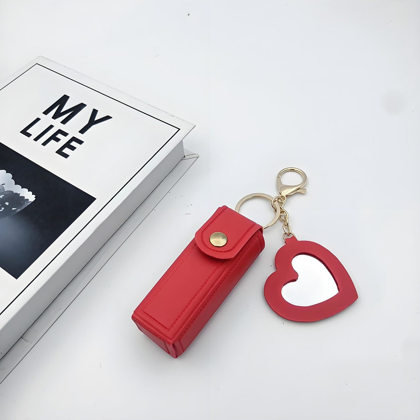 Charm con porta-pintalabios con espejo