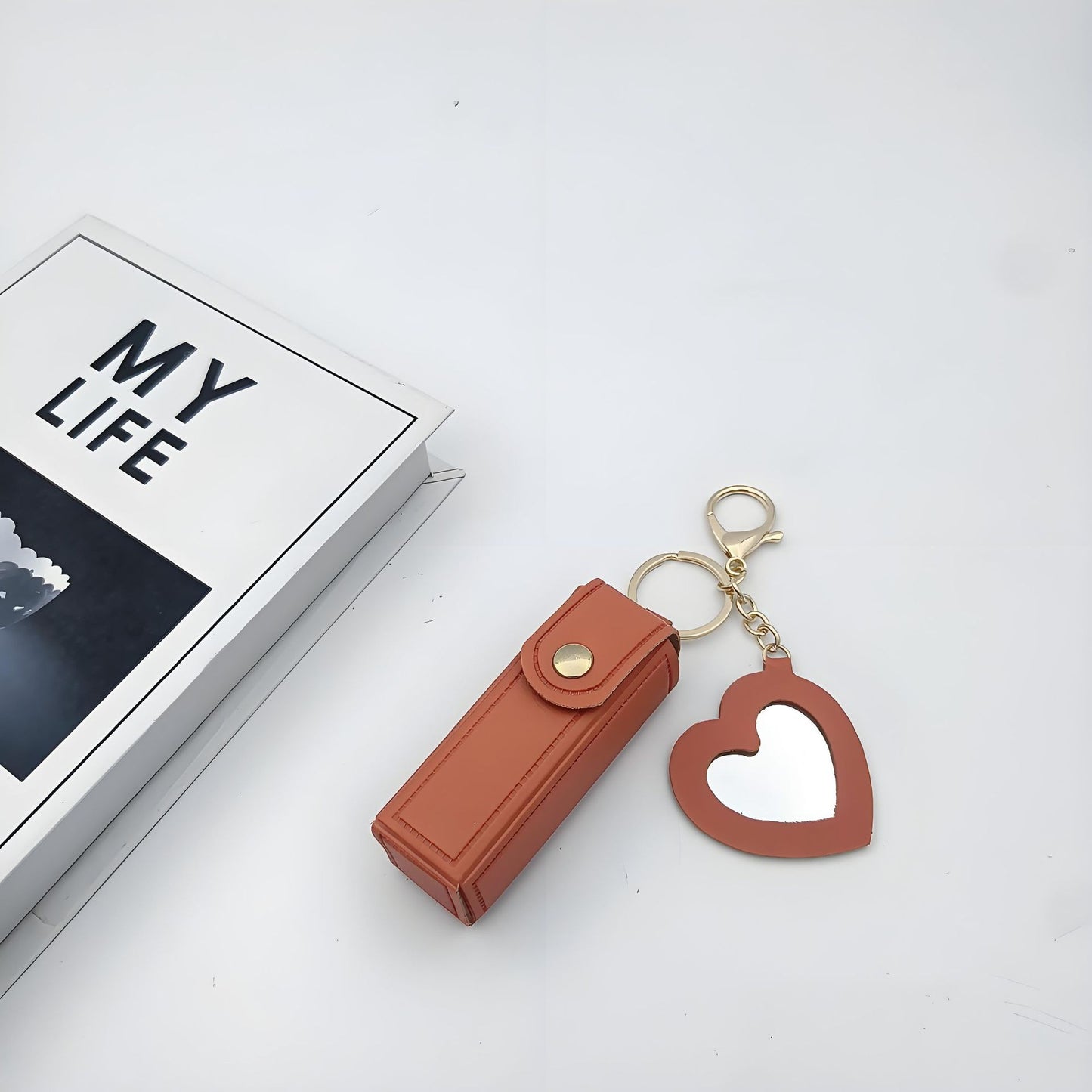 Charm con porta-pintalabios con espejo