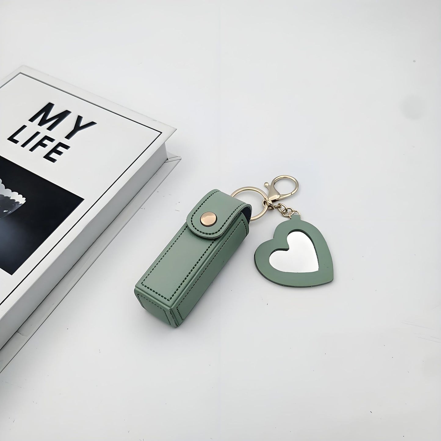 Charm con porta-pintalabios con espejo